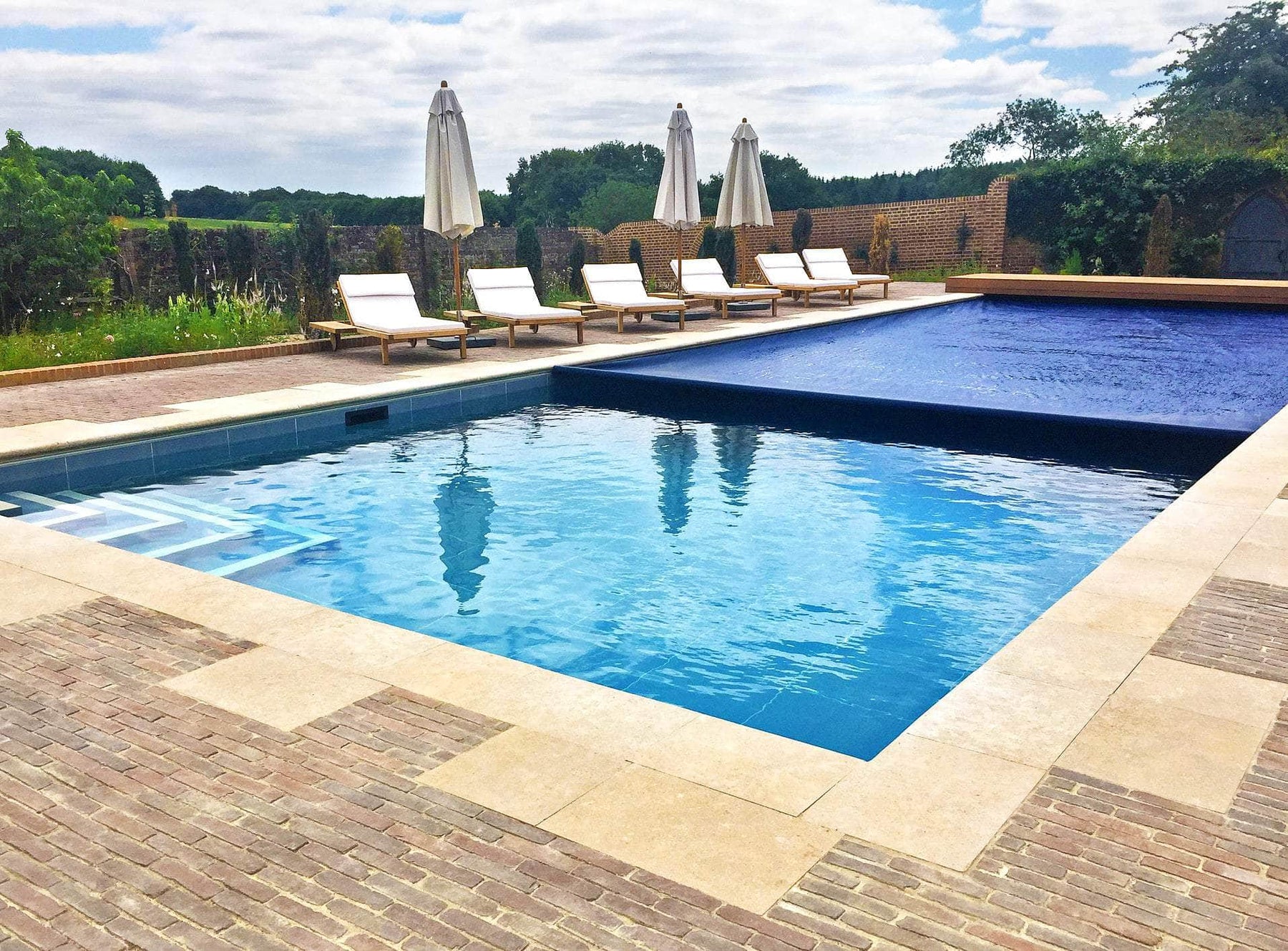 The Swimming Pool Co. Luxury Design, Build & Servicing. Deep End Pools